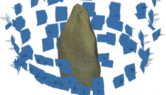 Blue rectangles surrounding a carved stone