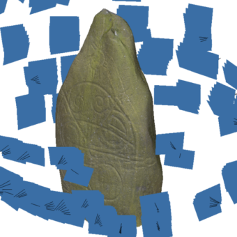 Blue rectangles surrounding a carved stone