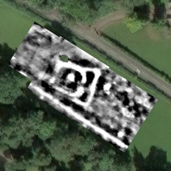 Results of a geophysical survey showing the below-ground remains of a moated enclosure in a field