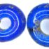 Photo of two tiny blue glass beads