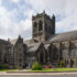 Photo of an abbey in a town centre