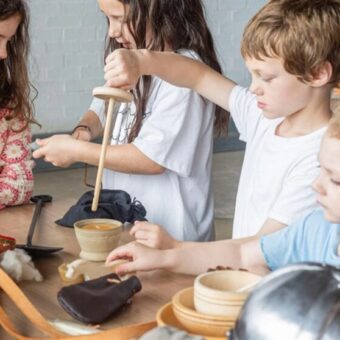 Photo of children playing with tools and toys