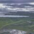 Aerial view of a rural, coastal landscape