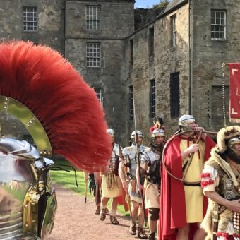 People in Roman armour